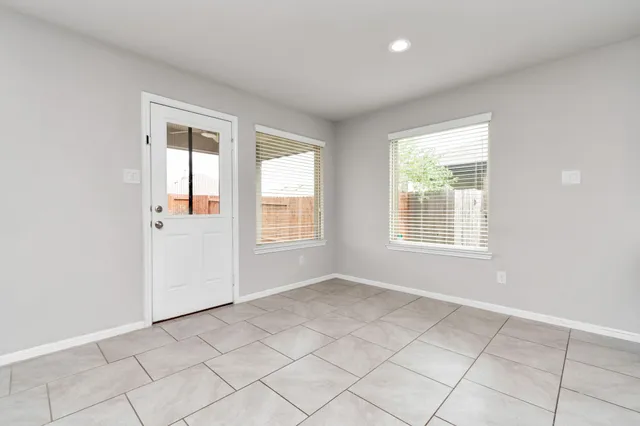 an empty room with windows