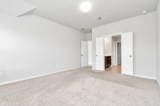 an empty room with an entryway