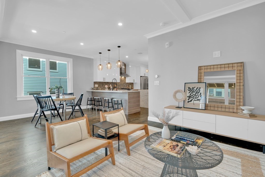 87 Parkton Road, Unit 3 Boston, MA 02130 - Photo 11 of 38 a living room with a couch and a table