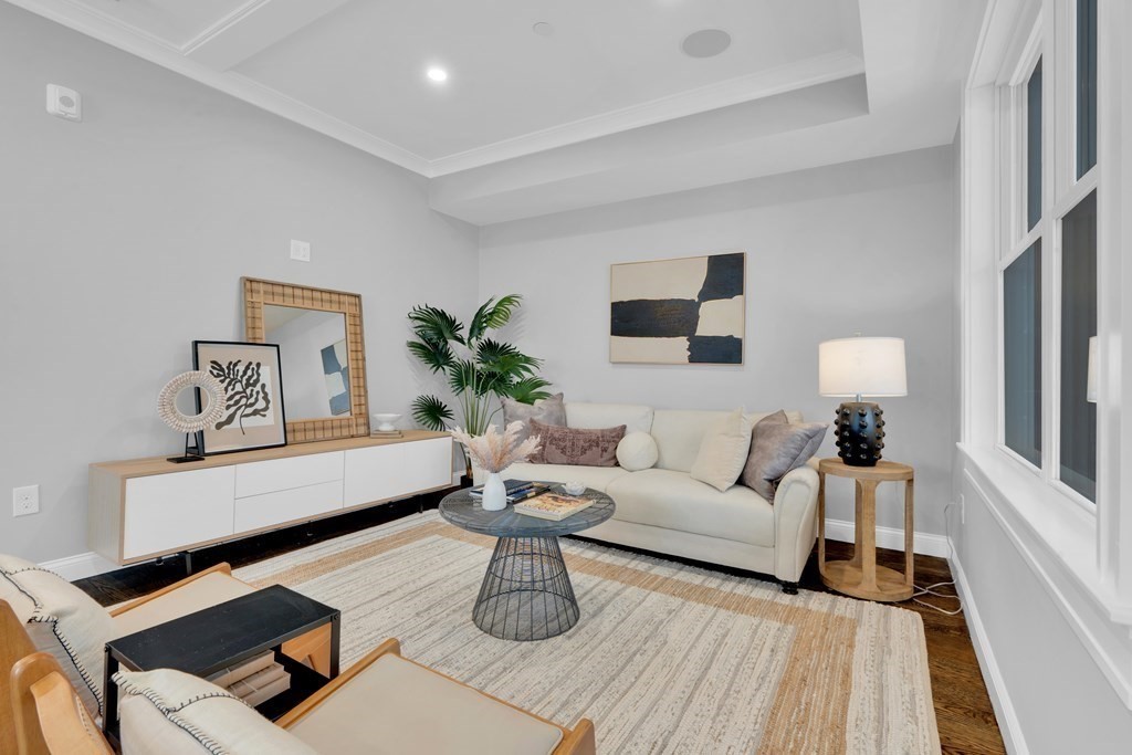 87 Parkton Road, Unit 3 Boston, MA 02130 - Photo 12 of 38 a living room with furniture and a lamp