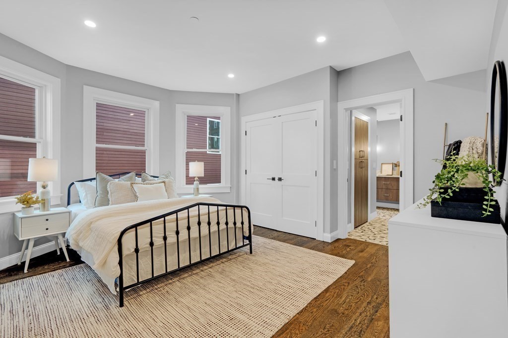 87 Parkton Road, Unit 3 Boston, MA 02130 - Photo 15 of 38 a bed room with a bed and a window