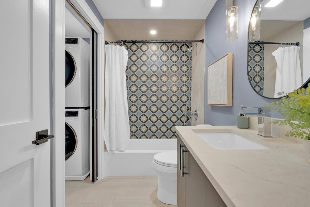 87 Parkton Road, Unit 3 Boston, MA 02130 - Photo 22 of 38 a bathroom with a sink a toilet and shower