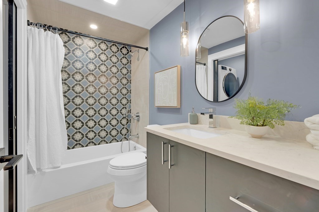 87 Parkton Road, Unit 3 Boston, MA 02130 - Photo 23 of 38 a bathroom with a sink toilet and shower