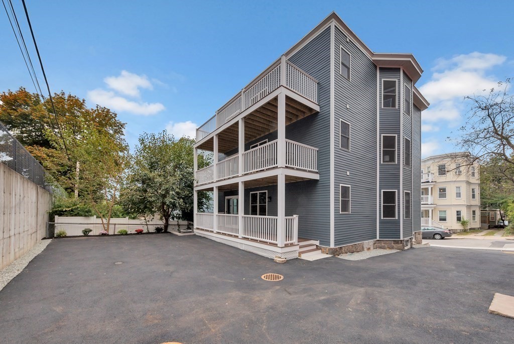 87 Parkton Road, Unit 3 Boston, MA 02130 - Photo 35 of 38 a view of a house with a street