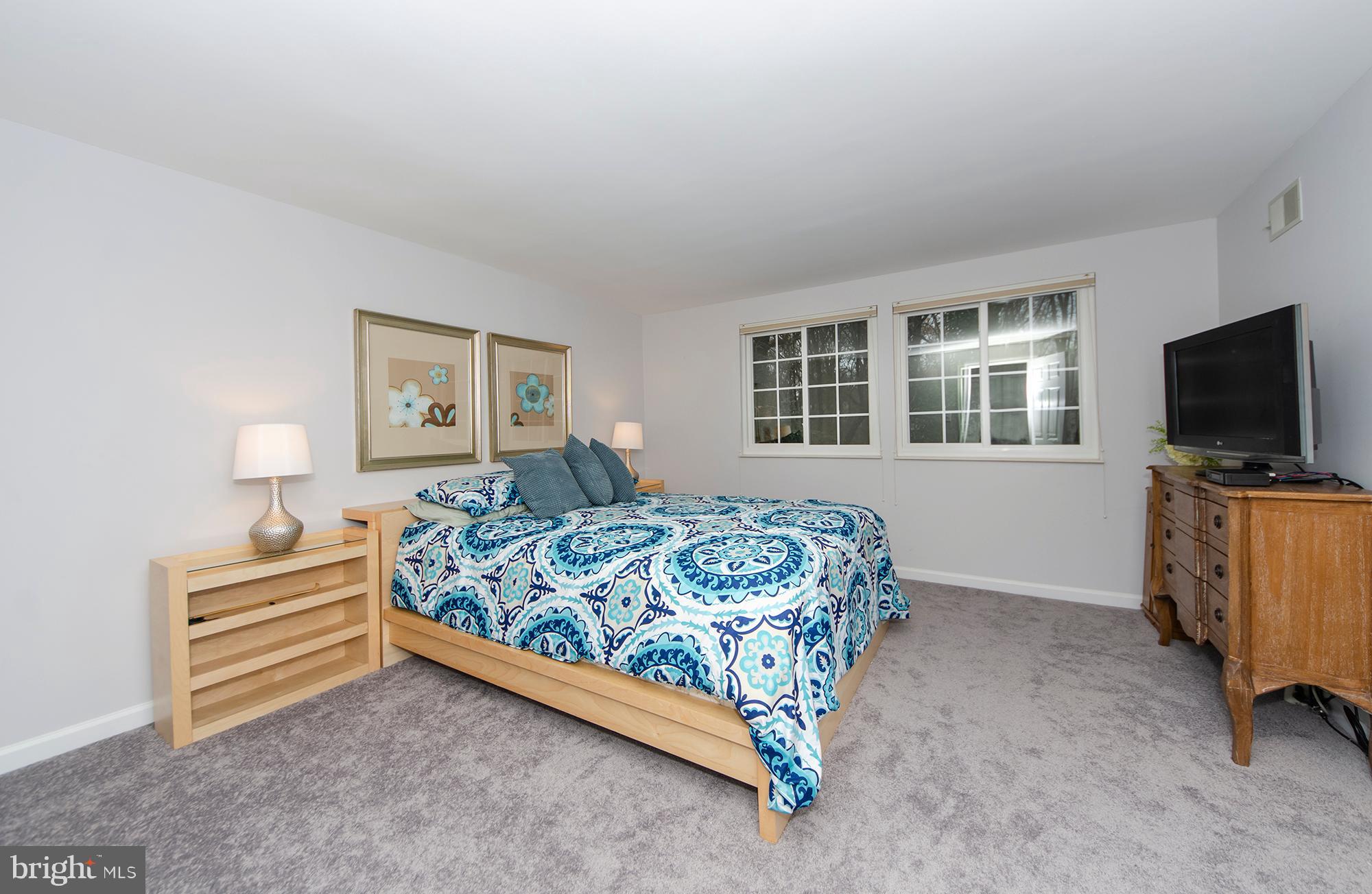 2351 Middle Creek Lane Reston, VA 20191 - Photo 14 of 27 Large primary bedroom w/ ensuite bath