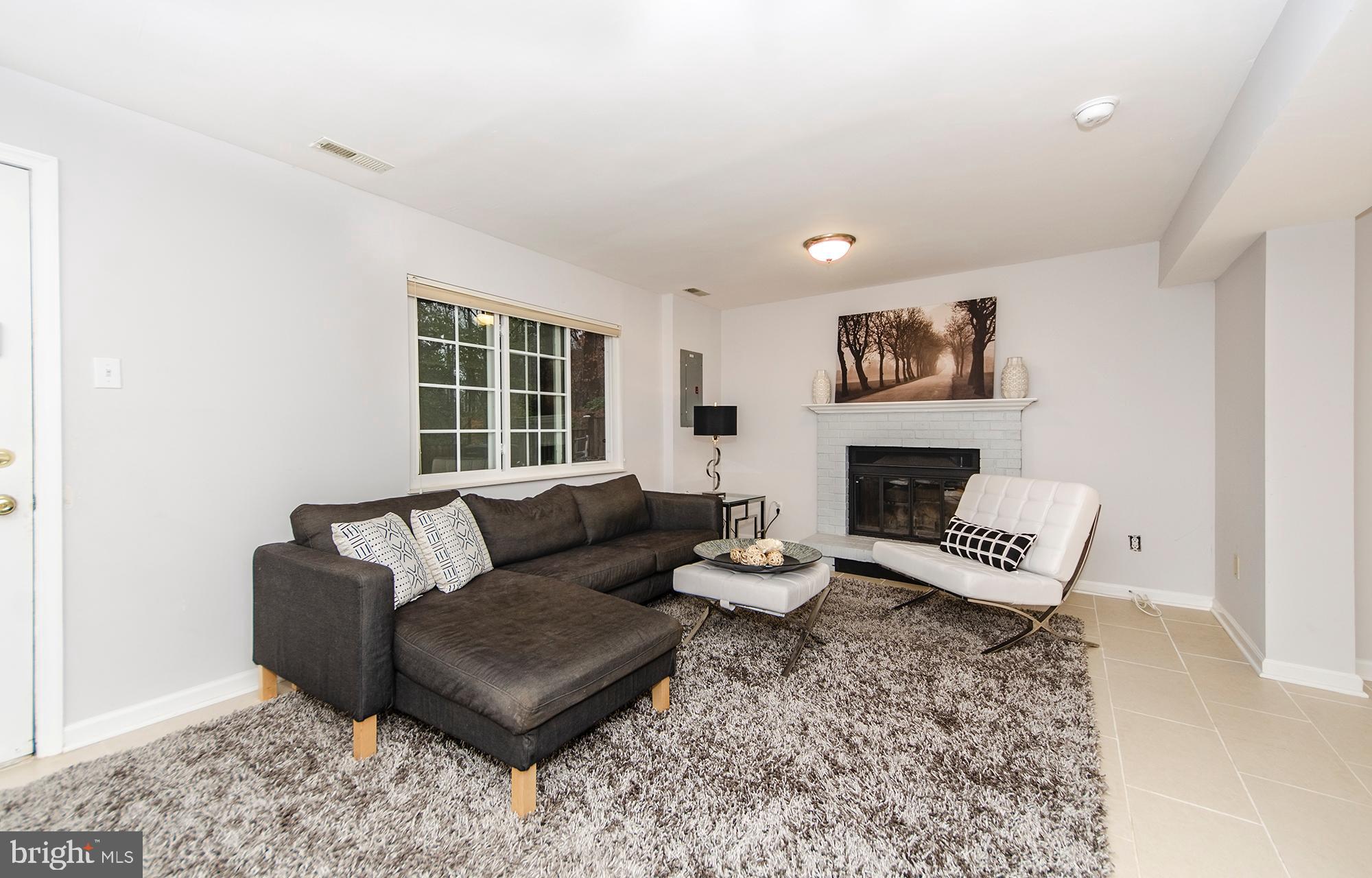 2351 Middle Creek Lane Reston, VA 20191 - Photo 23 of 27 Family room w/ door to brick patio and backyard