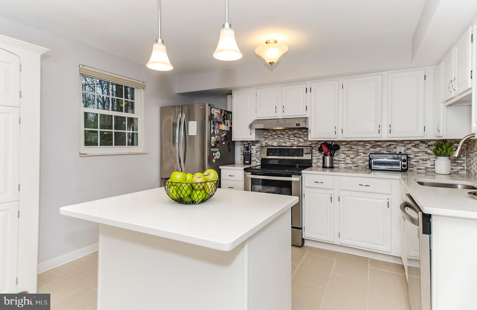 2351 Middle Creek Lane Reston, VA 20191 - Photo 6 of 27 Updated kitchen with quartz countertops