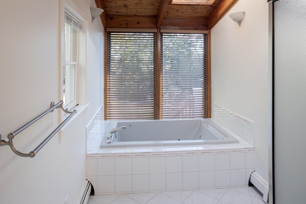 75 Nichols Road Cohasset, MA 02025 - Photo 14 of 15 a bathroom with a bathtub and a shower