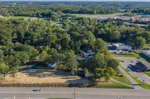 an aerial view of residential house with outdoor space