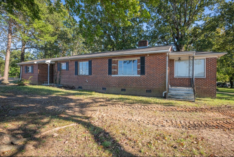 101 Sunset Road Dickson, TN 37055 - Photo 8 of 11 a view of a house with a yard