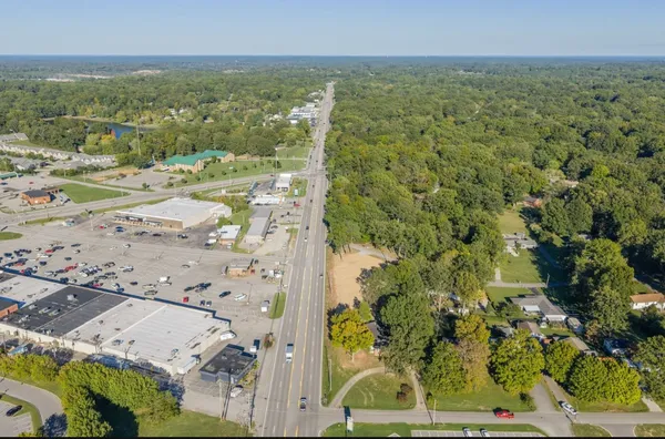 an aerial view of residential building with parking space