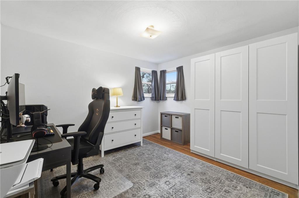 870 Middle Road Pittsburgh, PA 15234 - Photo 14 of 34 a view of a workspace with furniture and a gate