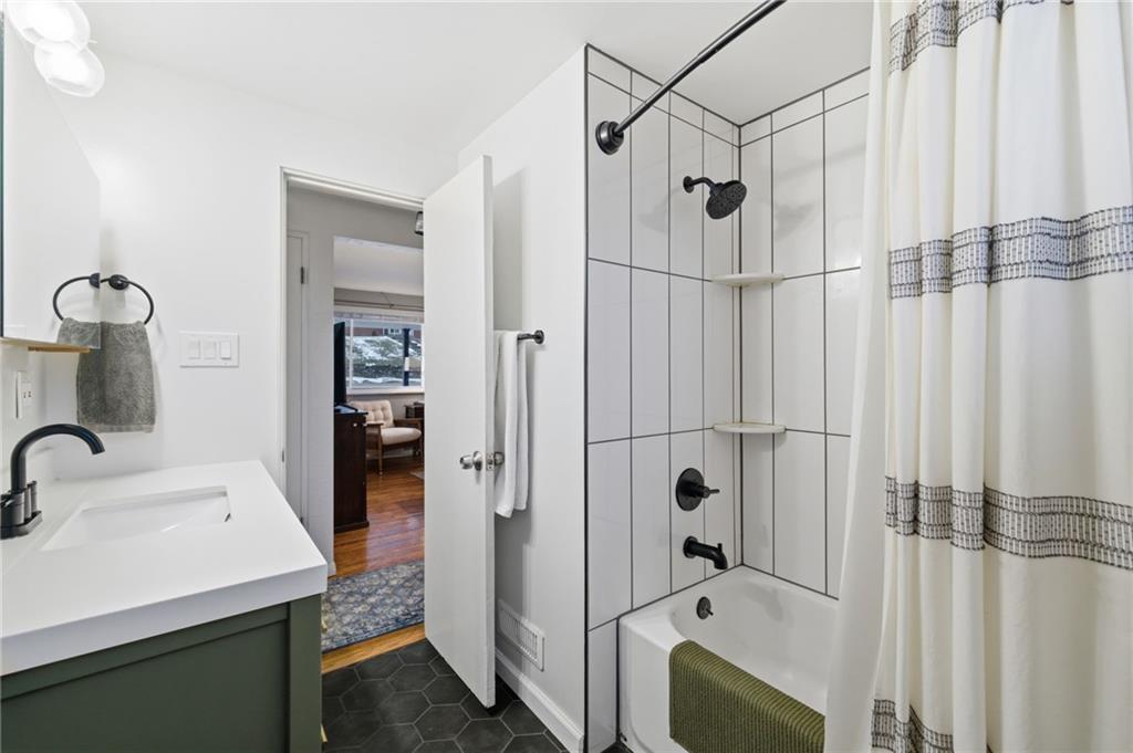 870 Middle Road Pittsburgh, PA 15234 - Photo 17 of 34 a bathroom with a sink and a shower