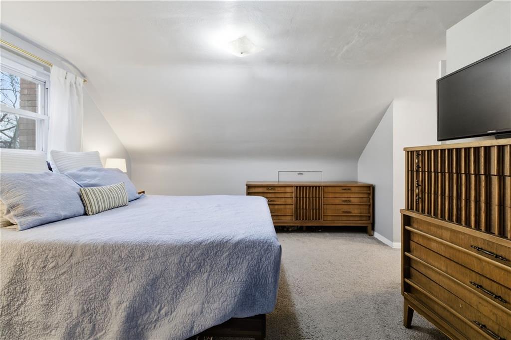 870 Middle Road Pittsburgh, PA 15234 - Photo 20 of 34 a bedroom with a bed and a flat screen tv