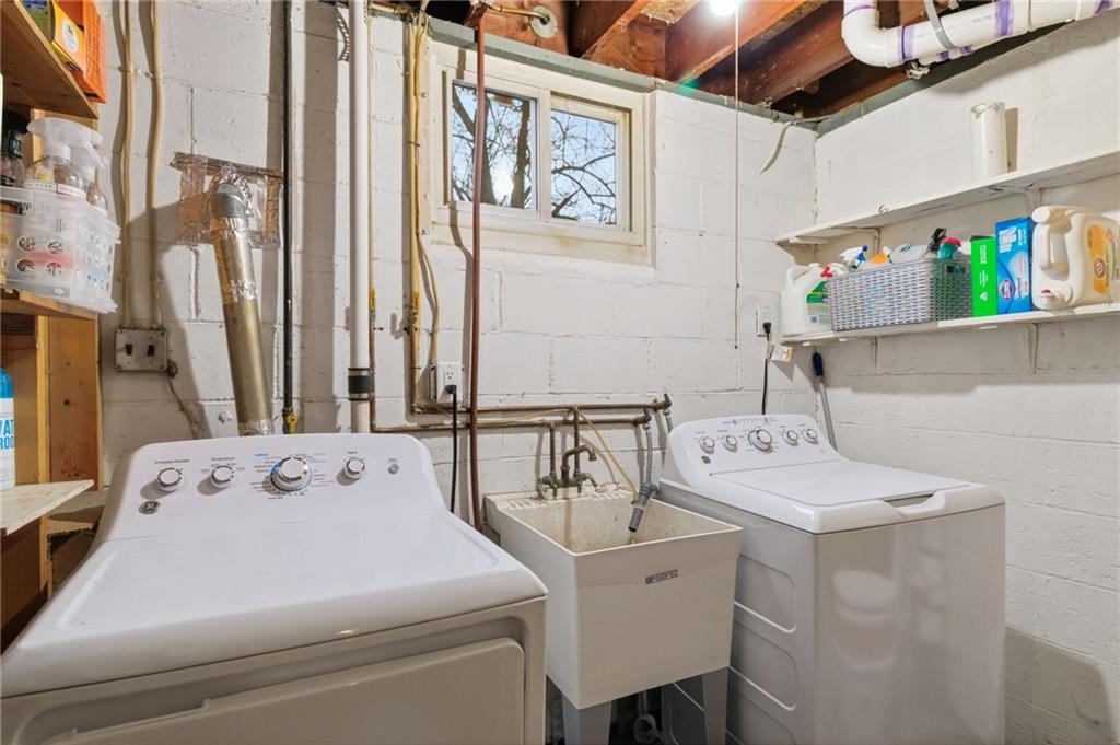 870 Middle Road Pittsburgh, PA 15234 - Photo 27 of 34 a utility room with dryer and washer