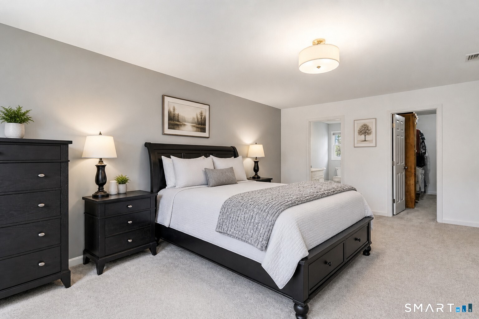 45 Beardsley Road New Milford, CT 06776 - Photo 20 of 40 The spacious primary suite serves as a true retreat, featuring a large walk-in closet