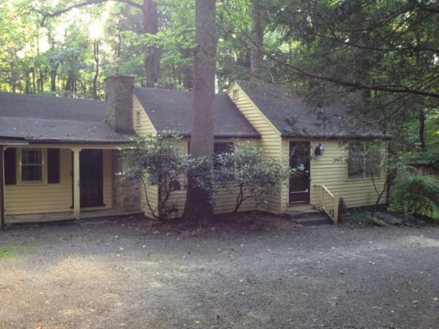 63 Hanover Road Newtown, CT 06470 - Photo 1 of 1 a view of a house with a yard and tree