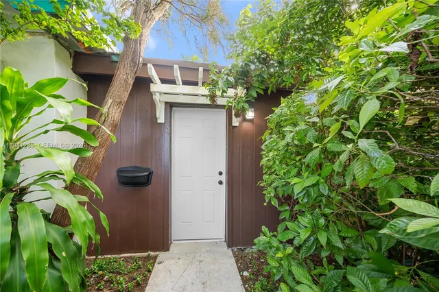 a house with lots of plant