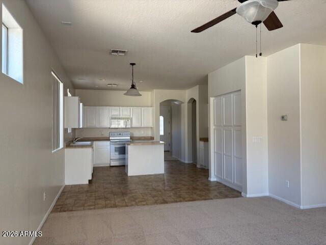 5624 West Vineyard Road Laveen, AZ 85339 - Photo 6 of 9 KITCHEN & FAMILY ROOM BRIGHT ALL NEW CAR
