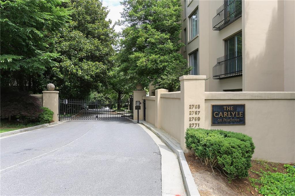 2769 Peachtree Road Northeast, Unit 2 Atlanta, GA 30305 - Photo 3 of 5 a sign that is on the side of a building