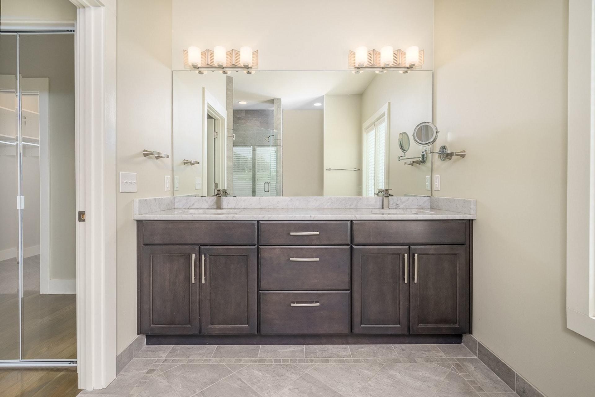 152 Cahas Summit Road Boones Mill, VA 24065 - Photo 8 of 63 a bathroom with a granite countertop sink a mirror and a