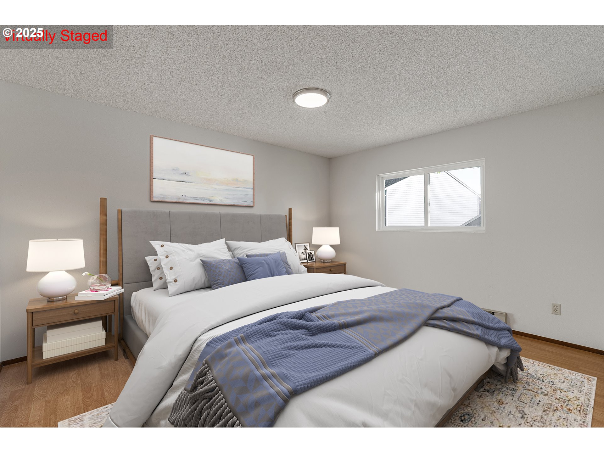 10915 Southwest Meadowbrook Drive, Unit 22 Portland, OR 97224 - Photo 14 of 23 a bedroom with a bed and a night stand