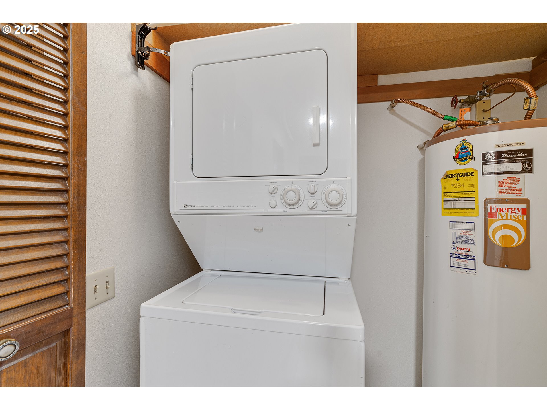 10915 Southwest Meadowbrook Drive, Unit 22 Portland, OR 97224 - Photo 19 of 23 a utility room with dryer and washer