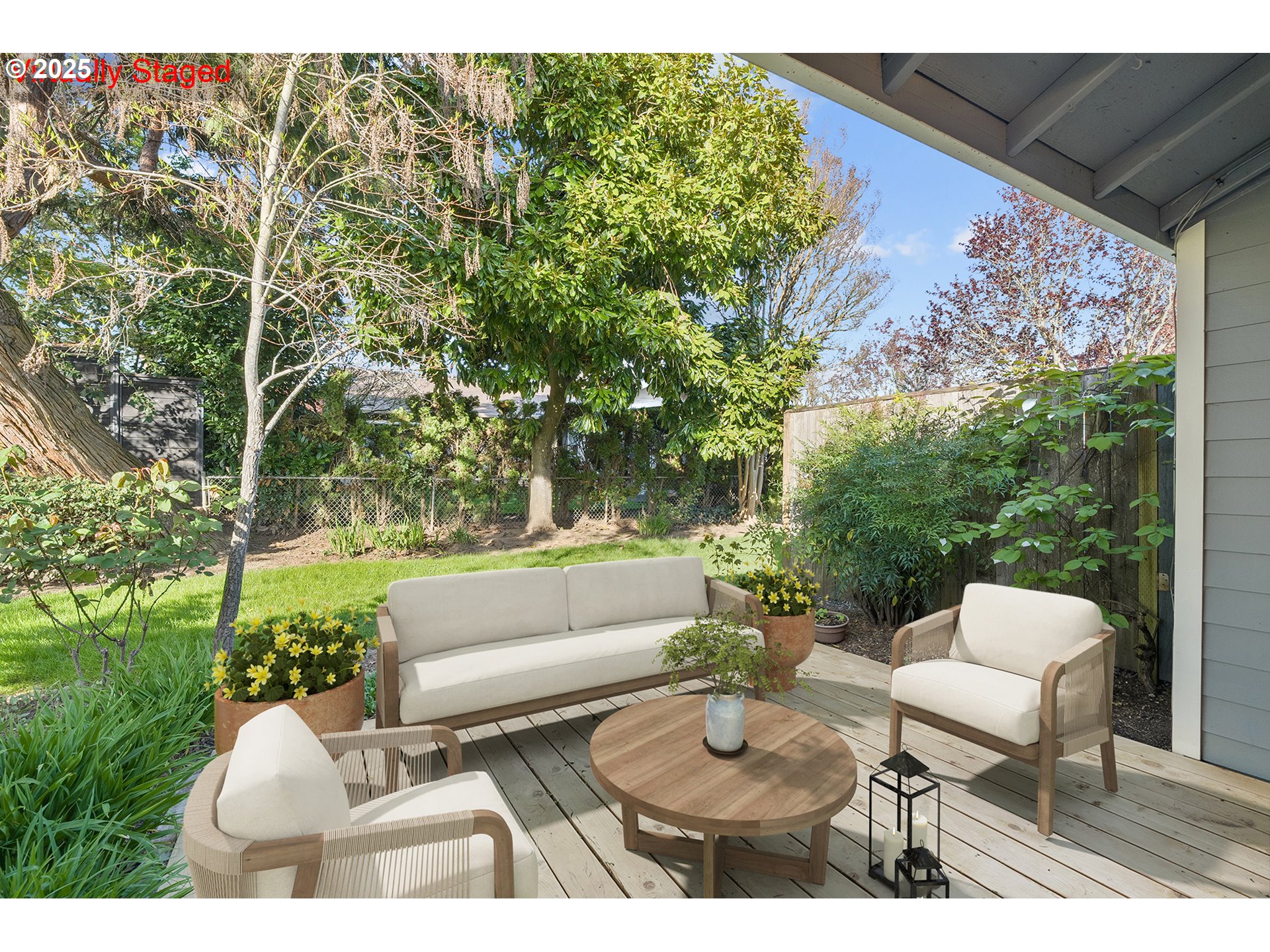 10915 Southwest Meadowbrook Drive, Unit 22 Portland, OR 97224 - Photo 20 of 23 a view of a patio with couches table and chairs and potted plants