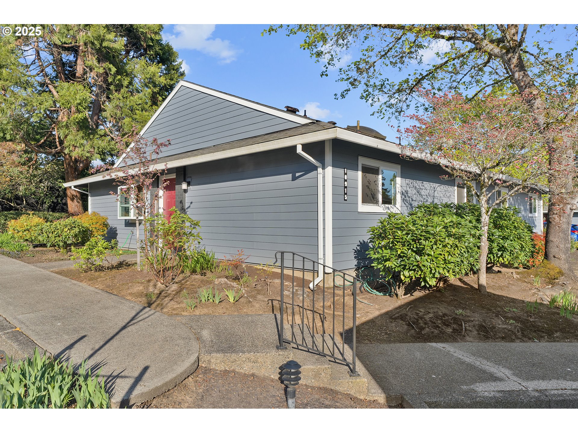 10915 Southwest Meadowbrook Drive, Unit 22 Portland, OR 97224 - Photo 4 of 23 a aerial view of a house with a yard
