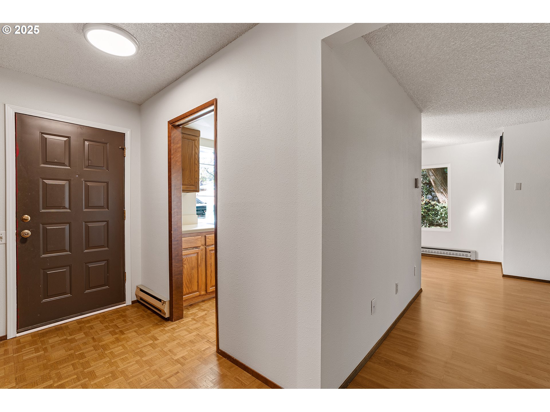 10915 Southwest Meadowbrook Drive, Unit 22 Portland, OR 97224 - Photo 6 of 23 a view interior of the house and wooden floor
