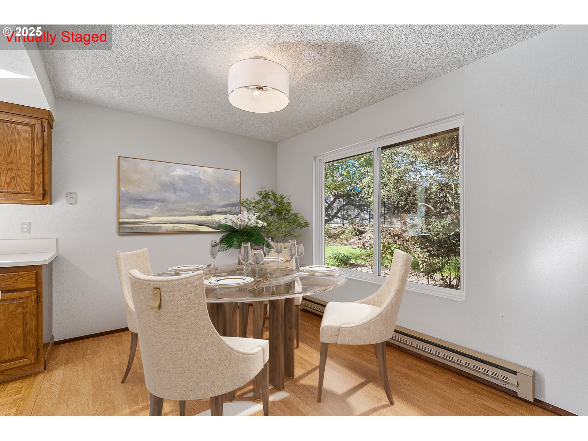 10915 Southwest Meadowbrook Drive, Unit 22 Portland, OR 97224 - Photo 8 of 23 a dining room with furniture and window
