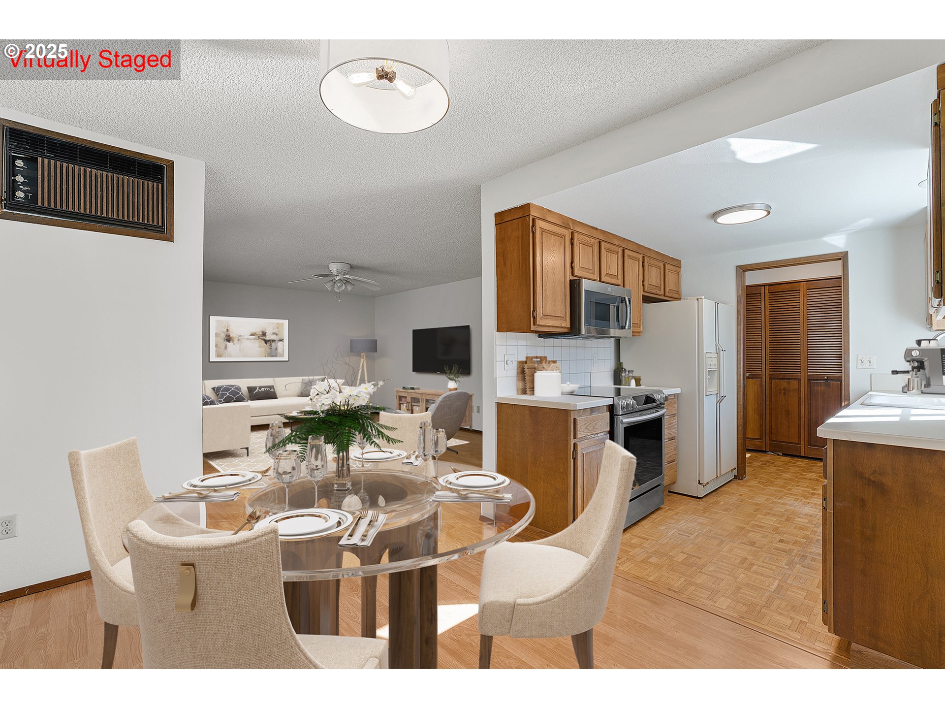 10915 Southwest Meadowbrook Drive, Unit 22 Portland, OR 97224 - Photo 9 of 23 a dining room with furniture and a kitchen view