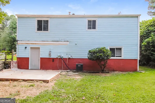 a view of outdoor space yard and front view of house