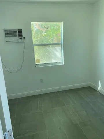 a view of a small space with a window