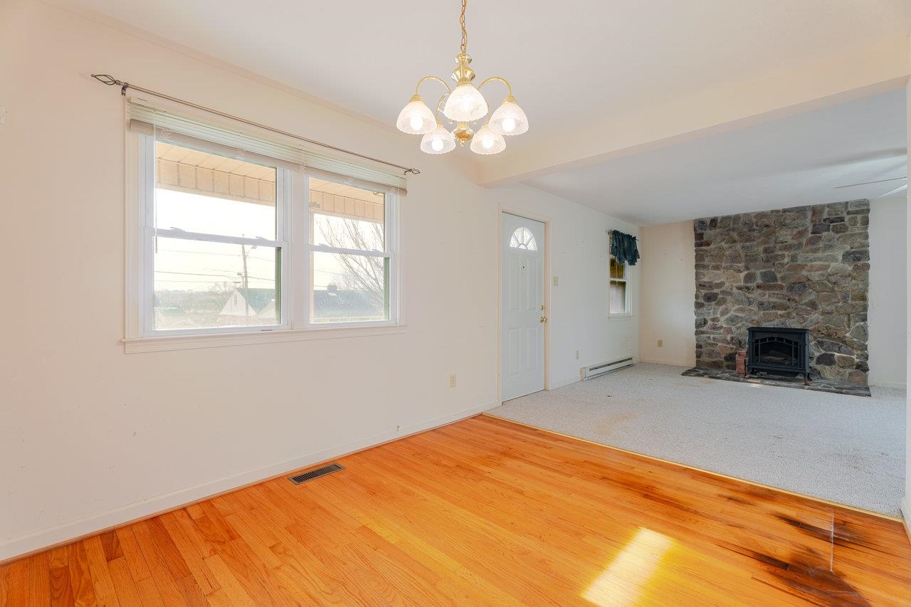 179 3rd Street Broadway, VA 22815 - Photo 17 of 38 a view of empty room with a fireplace