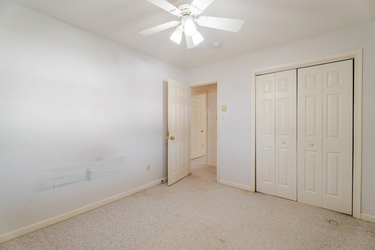 179 3rd Street Broadway, VA 22815 - Photo 24 of 38 an empty room with fan and entrance