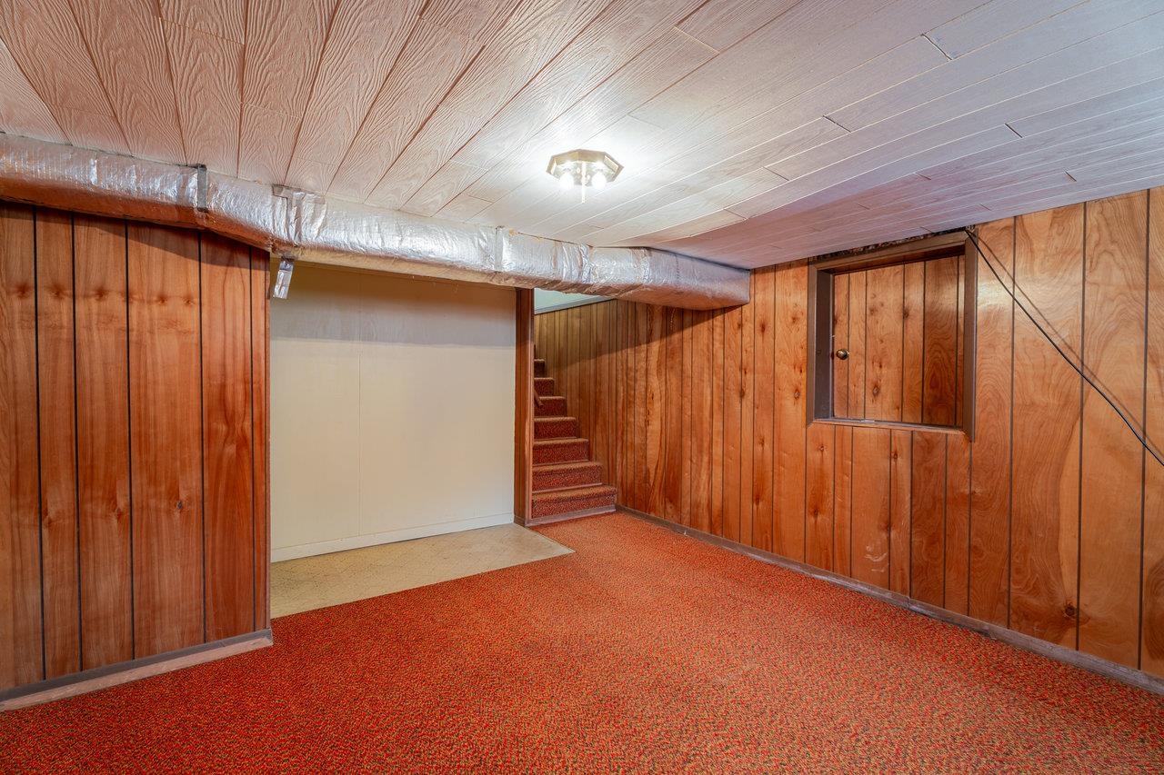 179 3rd Street Broadway, VA 22815 - Photo 27 of 38 a view of an empty room with wooden walls