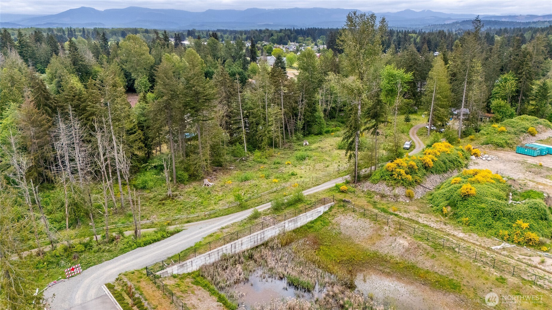 22512 Highway 410 Bonney Lake, WA 98391 - Photo 12 of 18 a view of an outdoor space and a mountain