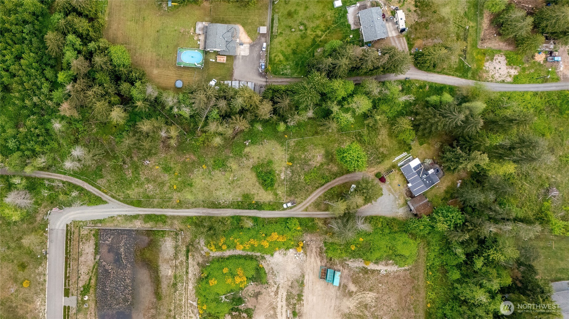 22512 Highway 410 Bonney Lake, WA 98391 - Photo 14 of 18 an aerial view of a house