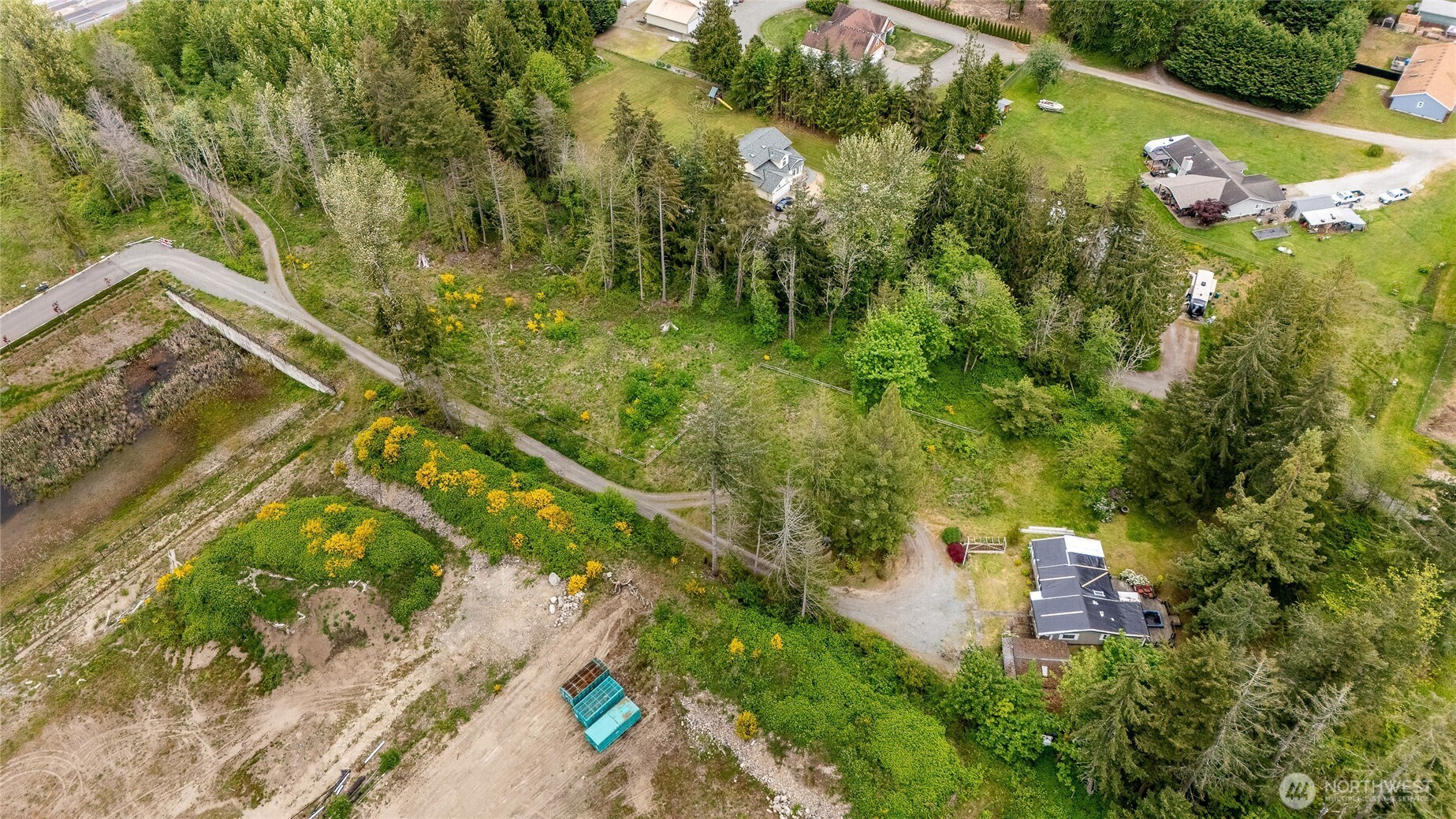 22512 Highway 410 Bonney Lake, WA 98391 - Photo 6 of 18 a view of a house with a yard