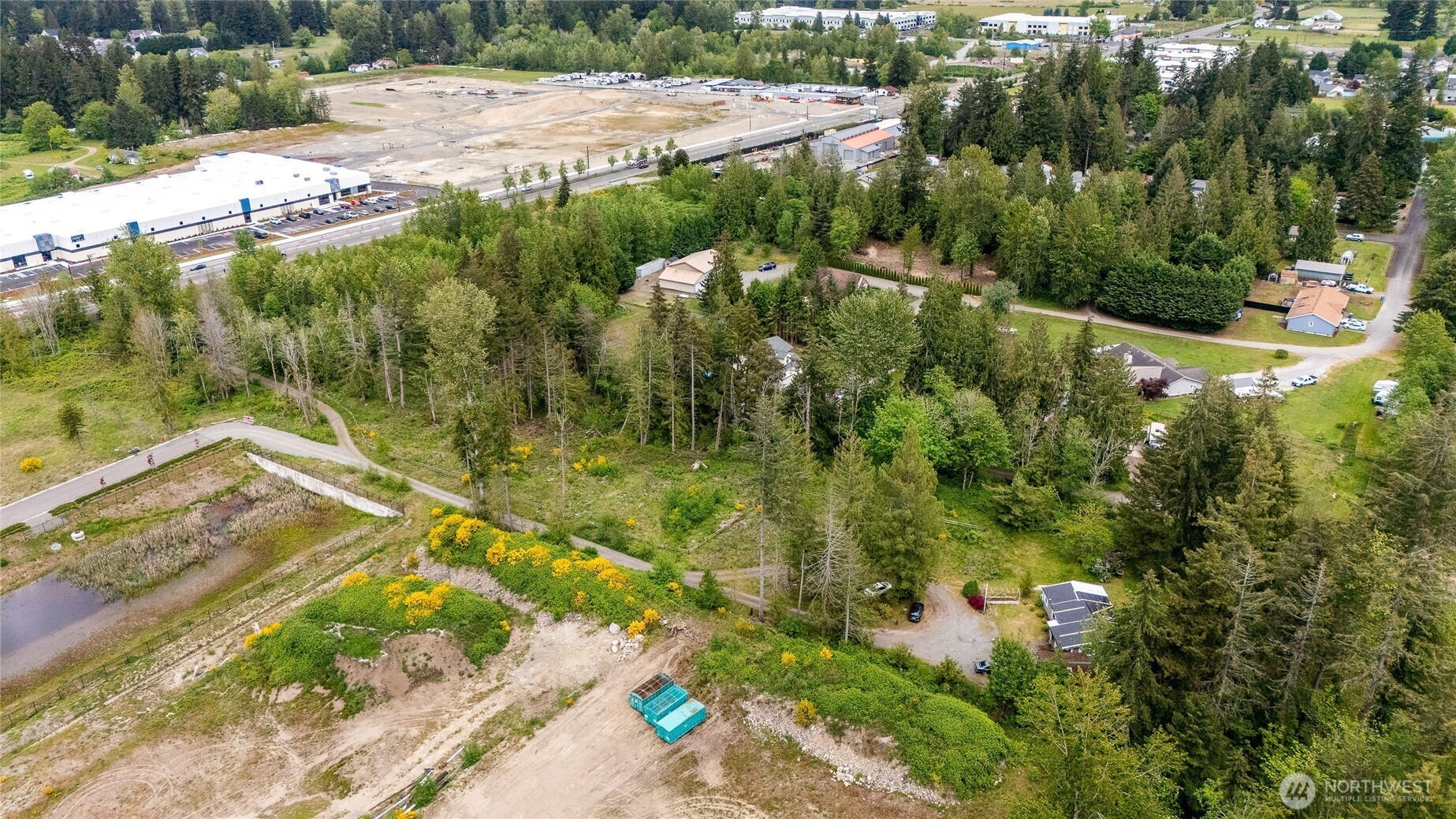 22512 Highway 410 Bonney Lake, WA 98391 - Photo 9 of 18 a view of a yard with plants