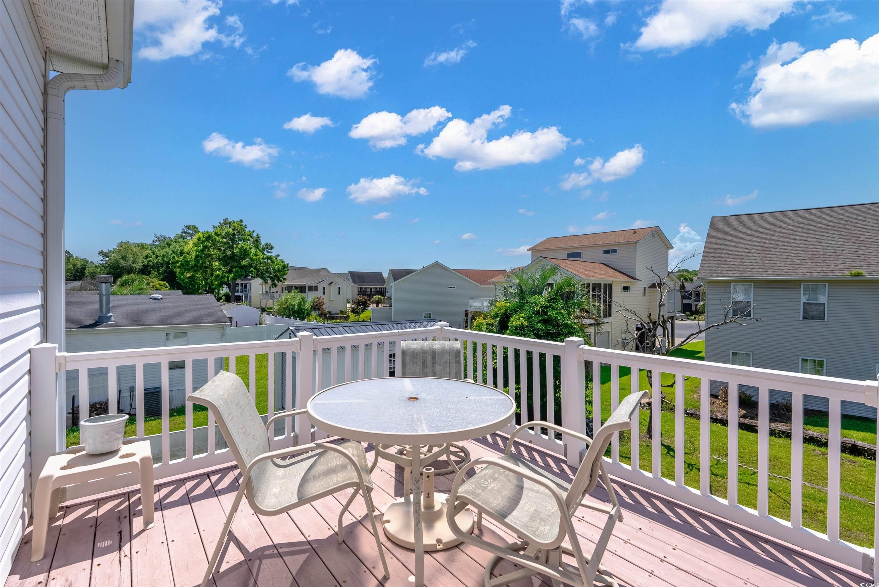 513 Rainbow Drive Murrells Inlet, SC 29576 - Photo 23 of 29 Deck with a lawn