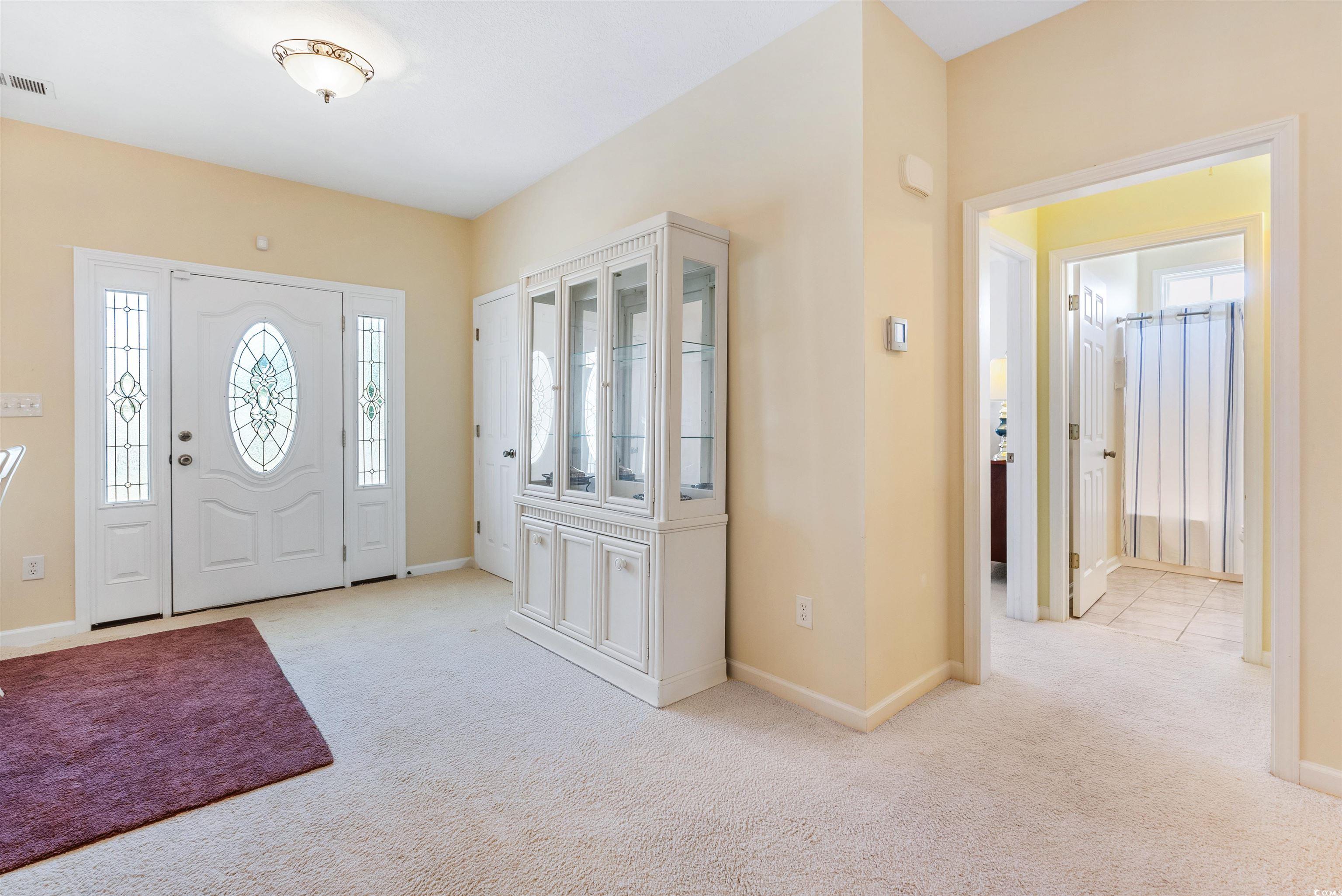 513 Rainbow Drive Murrells Inlet, SC 29576 - Photo 3 of 29 Foyer featuring light colored carpet