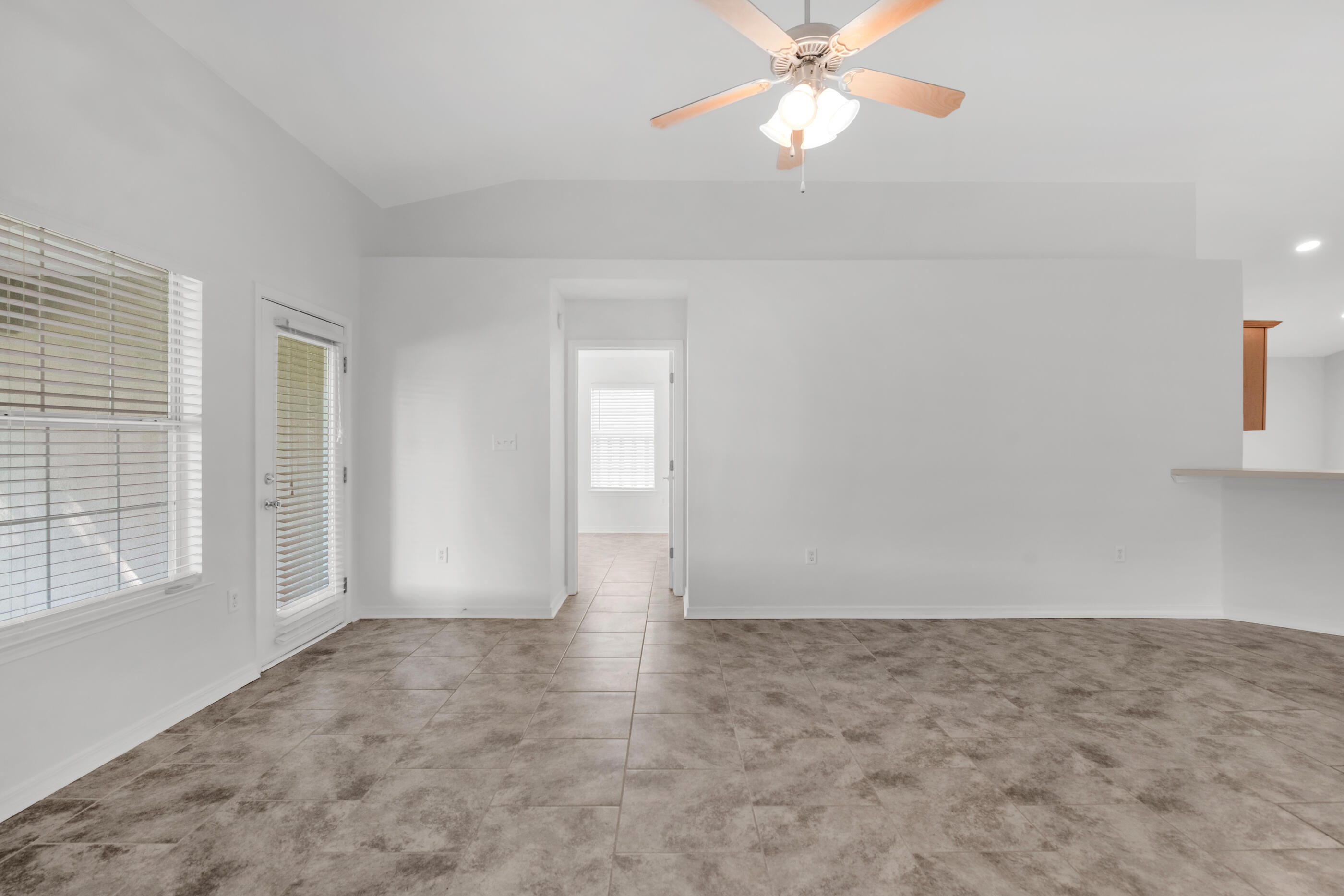 161 South Harborview Road Santa Rosa Beach, FL 32459 - Photo 12 of 39 an empty room with windows and fan