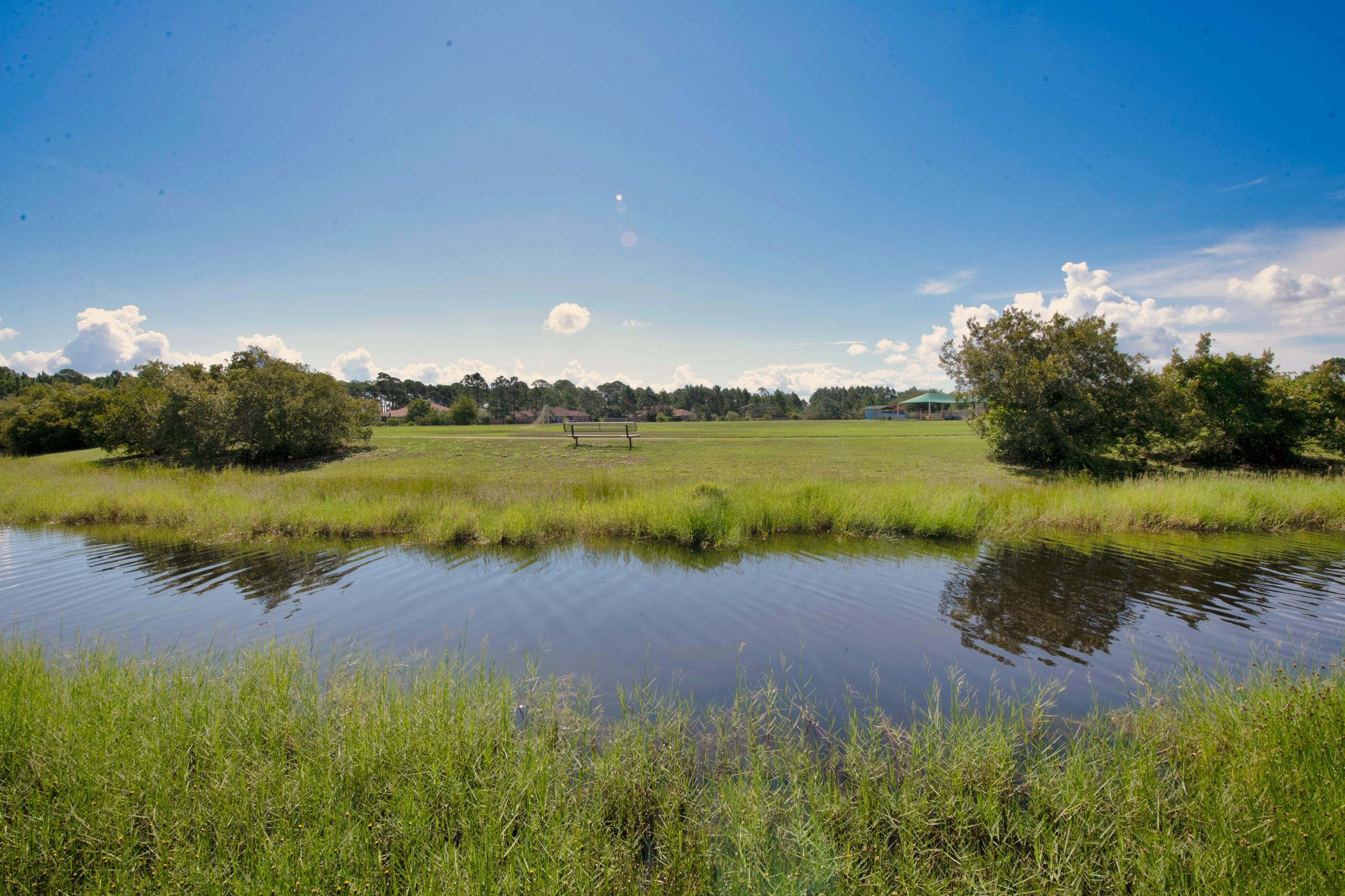 161 South Harborview Road Santa Rosa Beach, FL 32459 - Photo 21 of 39 a view of a lake with a big yard
