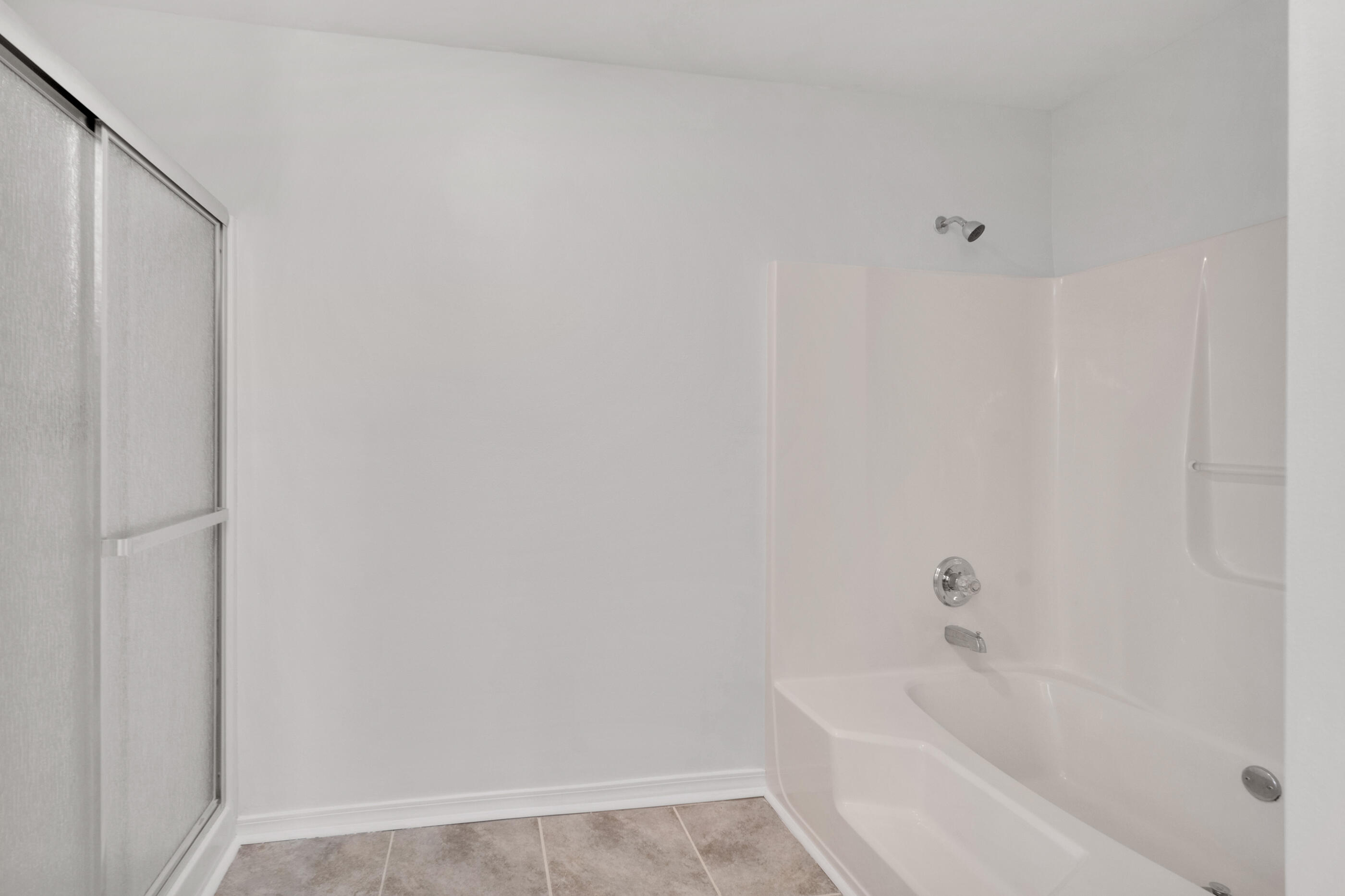 161 South Harborview Road Santa Rosa Beach, FL 32459 - Photo 26 of 39 a white bath tub sitting in a bathroom