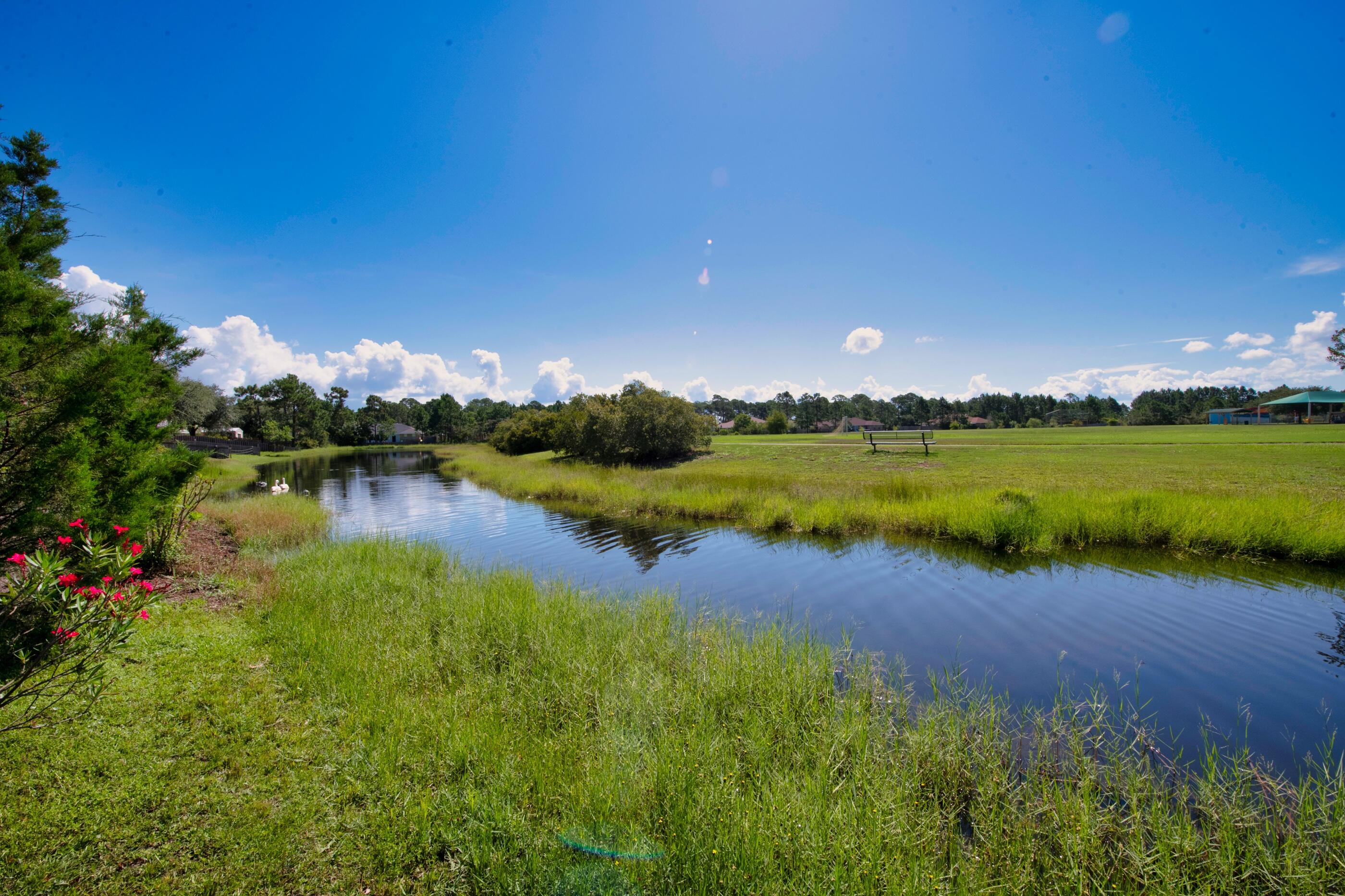 161 South Harborview Road Santa Rosa Beach, FL 32459 - Photo 28 of 39 a view of a lake with houses in the back