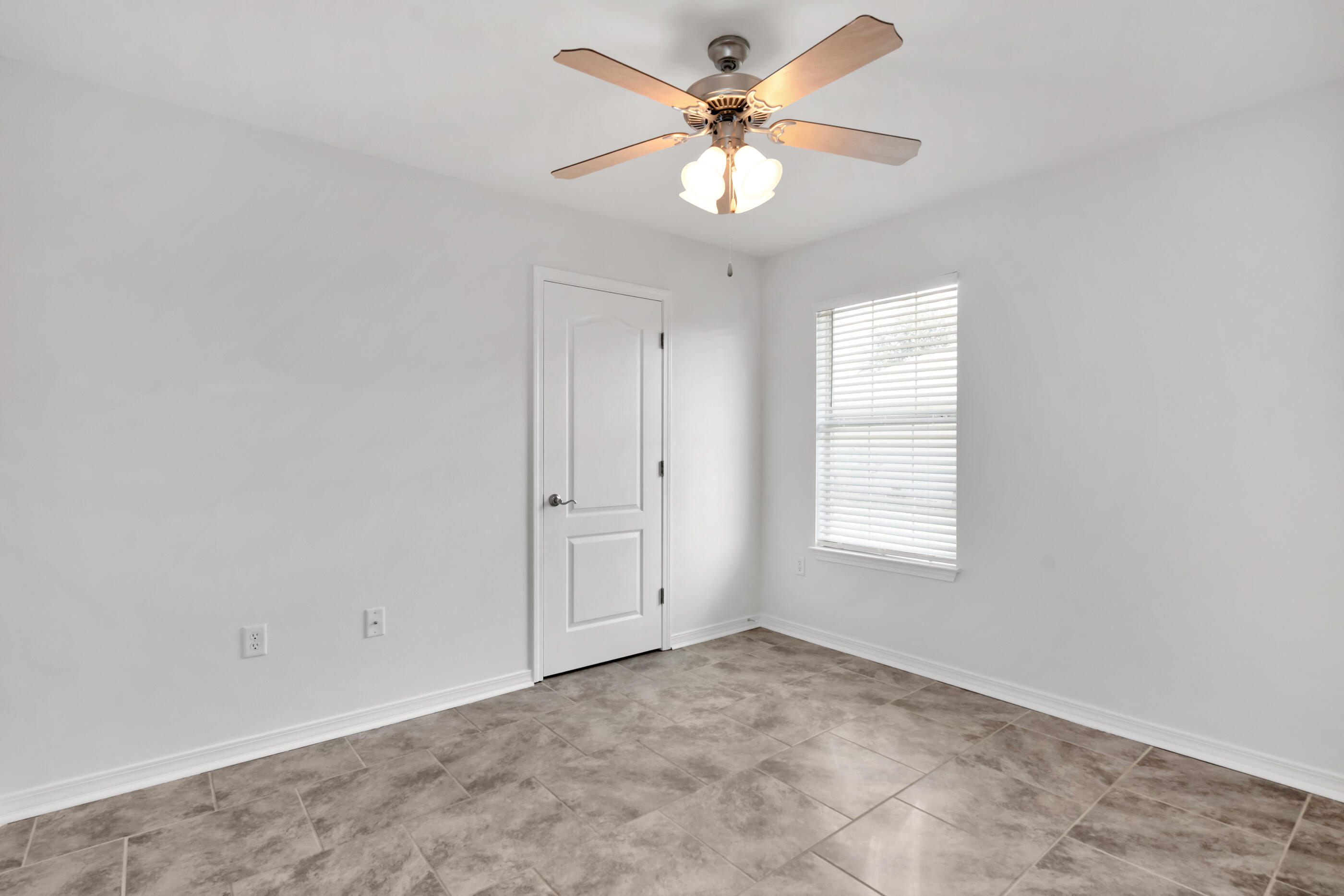 161 South Harborview Road Santa Rosa Beach, FL 32459 - Photo 32 of 39 an empty room with windows and fan