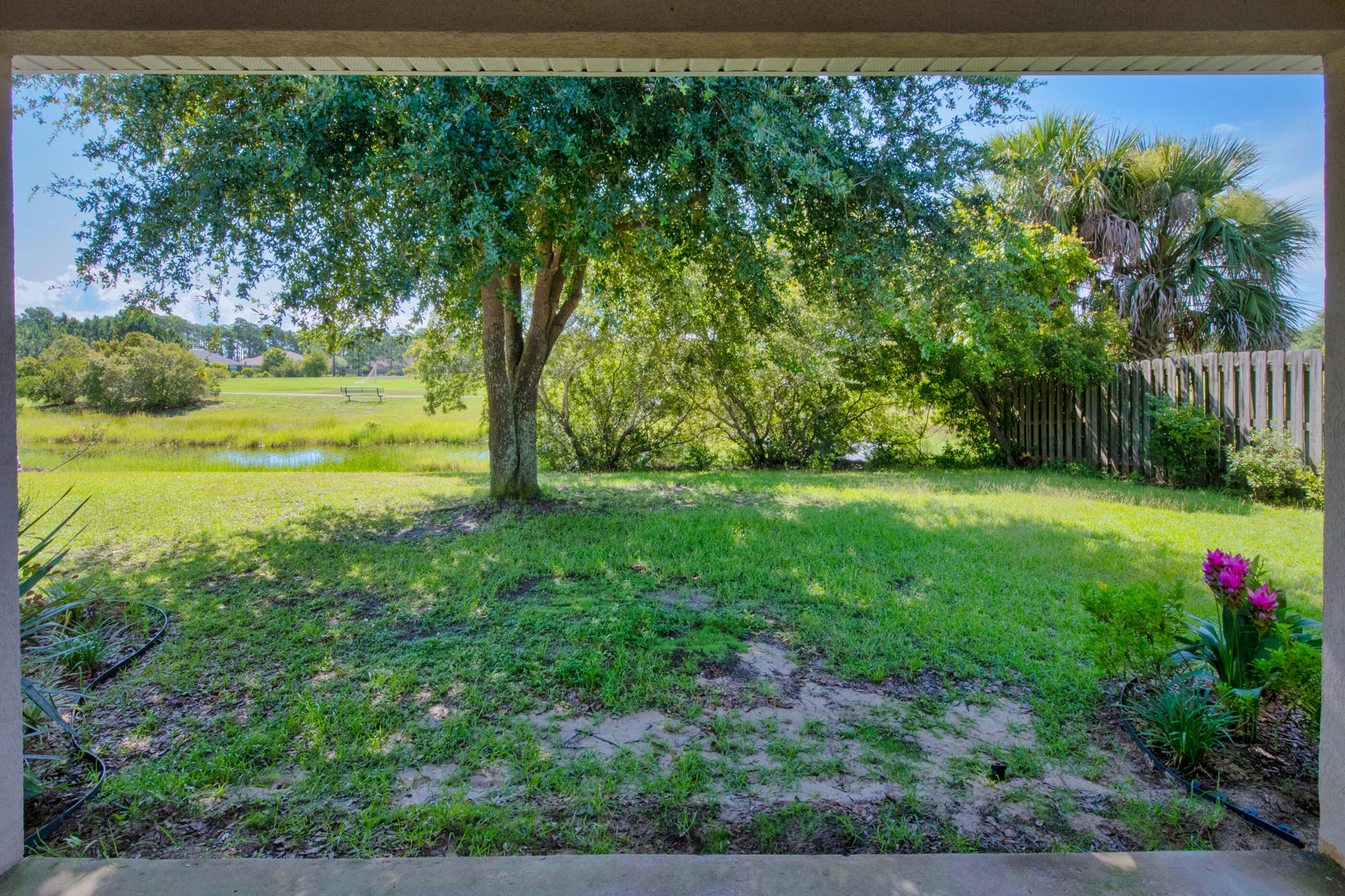 161 South Harborview Road Santa Rosa Beach, FL 32459 - Photo 35 of 39 a view of a garden with an outdoor space