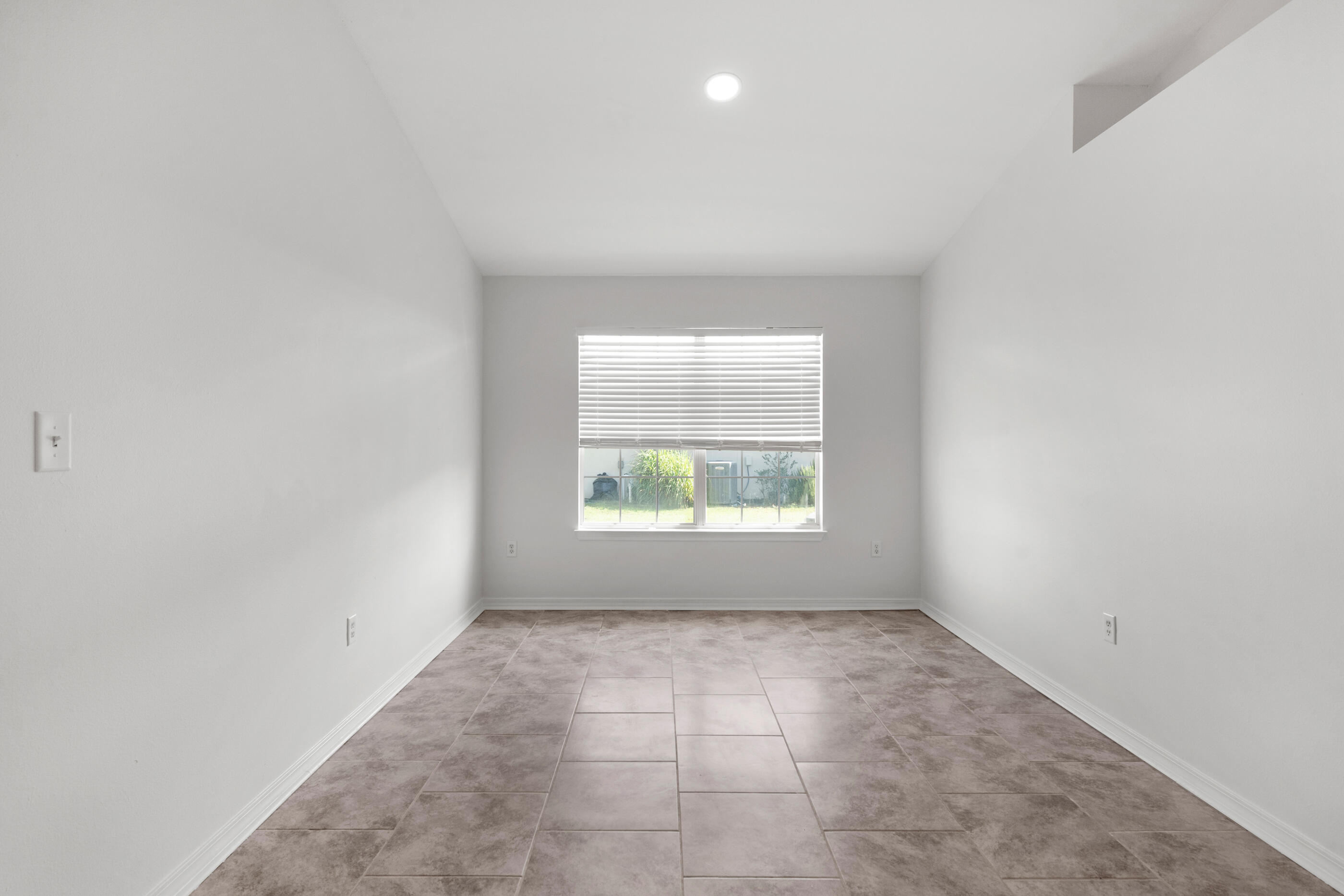 161 South Harborview Road Santa Rosa Beach, FL 32459 - Photo 9 of 39 an empty room with windows